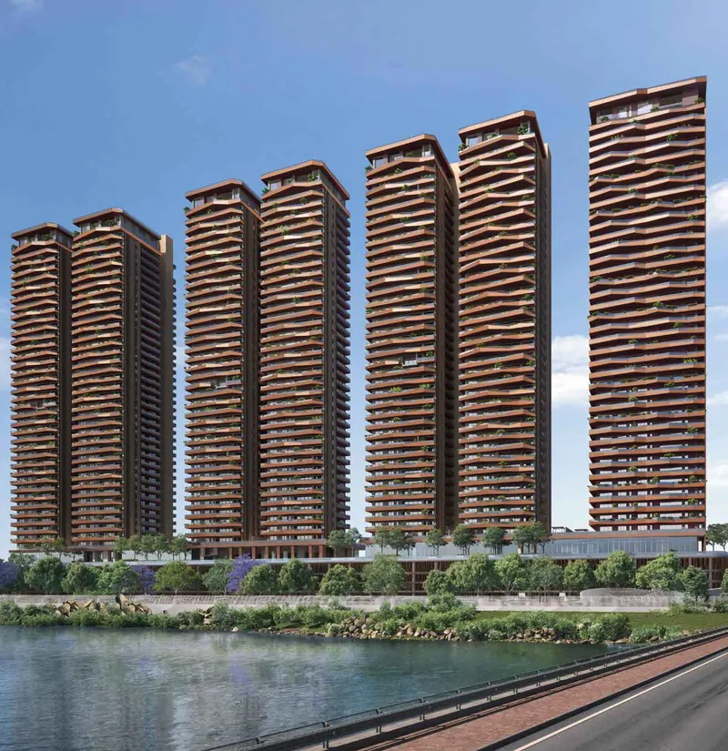 Sri Aditya Vantage towers seen across the river in Manchirevula, Narsingi