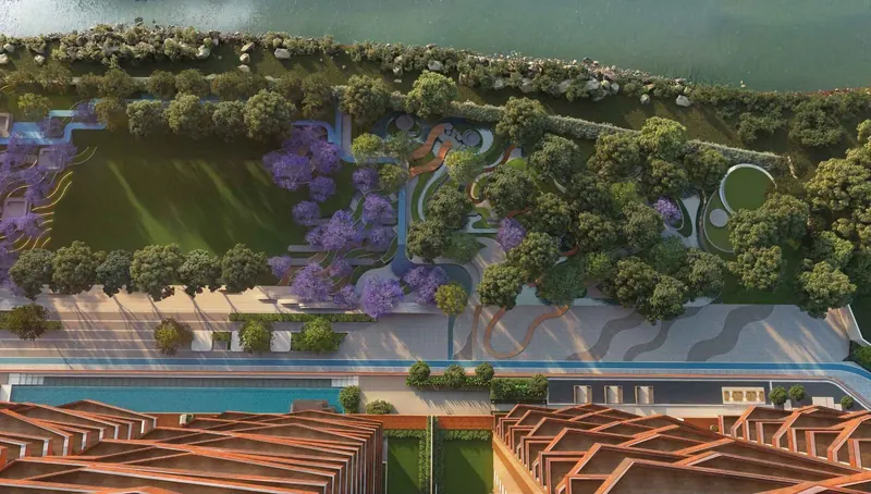 Riverside green buffer and gardens at Sri Aditya Vantage